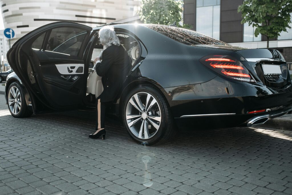 Corporate limo service for business meetings with executives inside